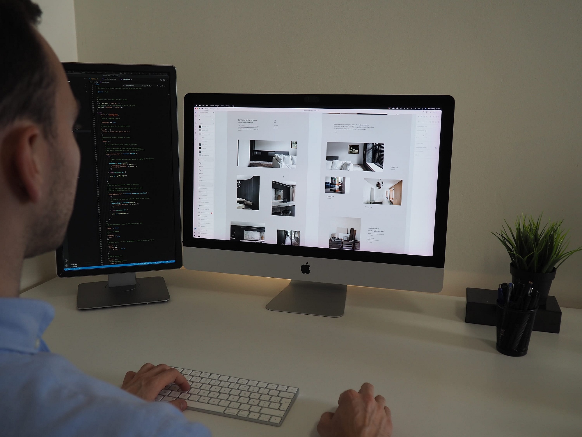 Maarten, founder of web design studio Heave Antwerp, looks closely at the code on a computer screen and the design of a website.